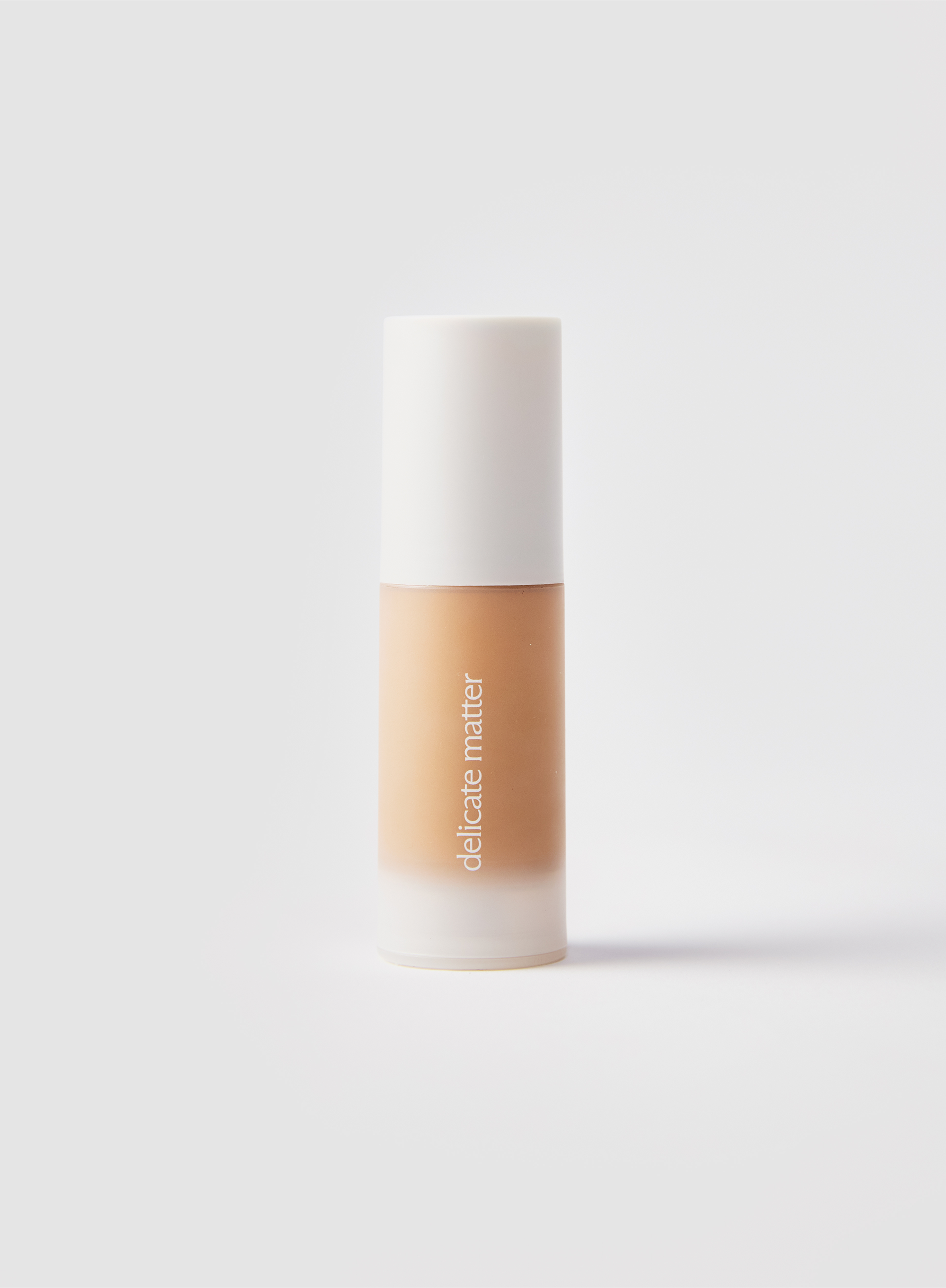 Acne-safe skin tint in shade 4 with 'delicate matter' branding 
