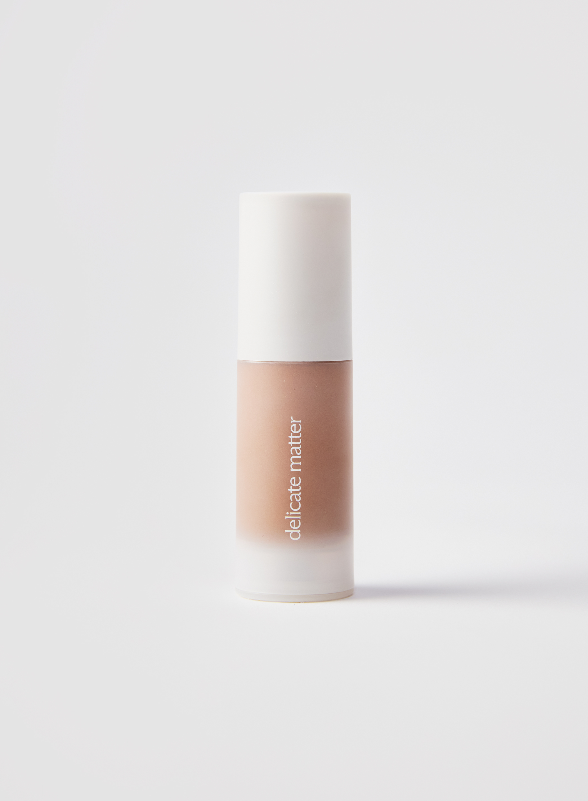 Acne-safe skin tint in shade 5 with 'delicate matter' branding 
