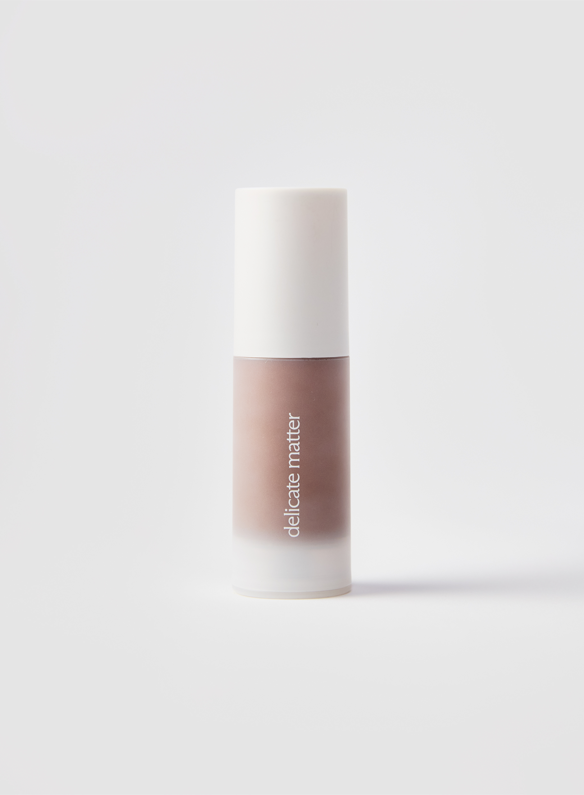 Acne-safe skin tint in shade 6 with 'delicate matter' branding 